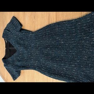 An elegant versatile tweed dress in deep green and black back